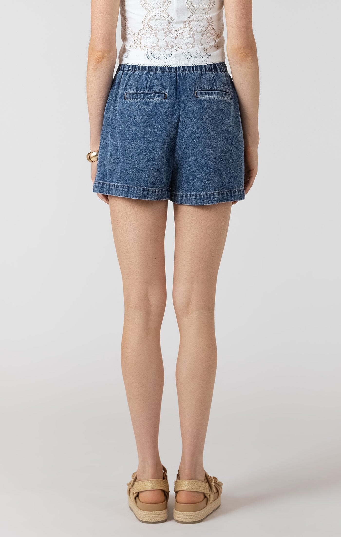 everyday summer shorts, casual denim outfit women, easy wear denim shorts, vacation denim shorts, spring summer shorts women, relaxed casual shorts women, medium blue denim shorts, drawstring waist shorts women, chic casual shorts, minimal summer outfit shorts, versatile denim shorts women, denim shorts outfit women