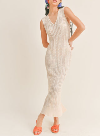 A chic and comfortable Rosemary Beige Knit Dress with a crochet style, v-neckline, and fitted silhouette.
